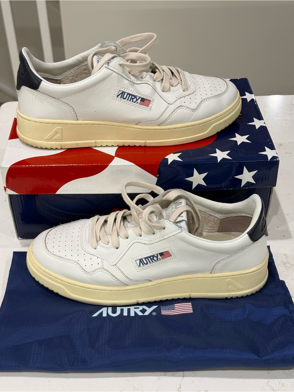 AUTRY Men’s White Leather Court Sneakers with Navy Heel